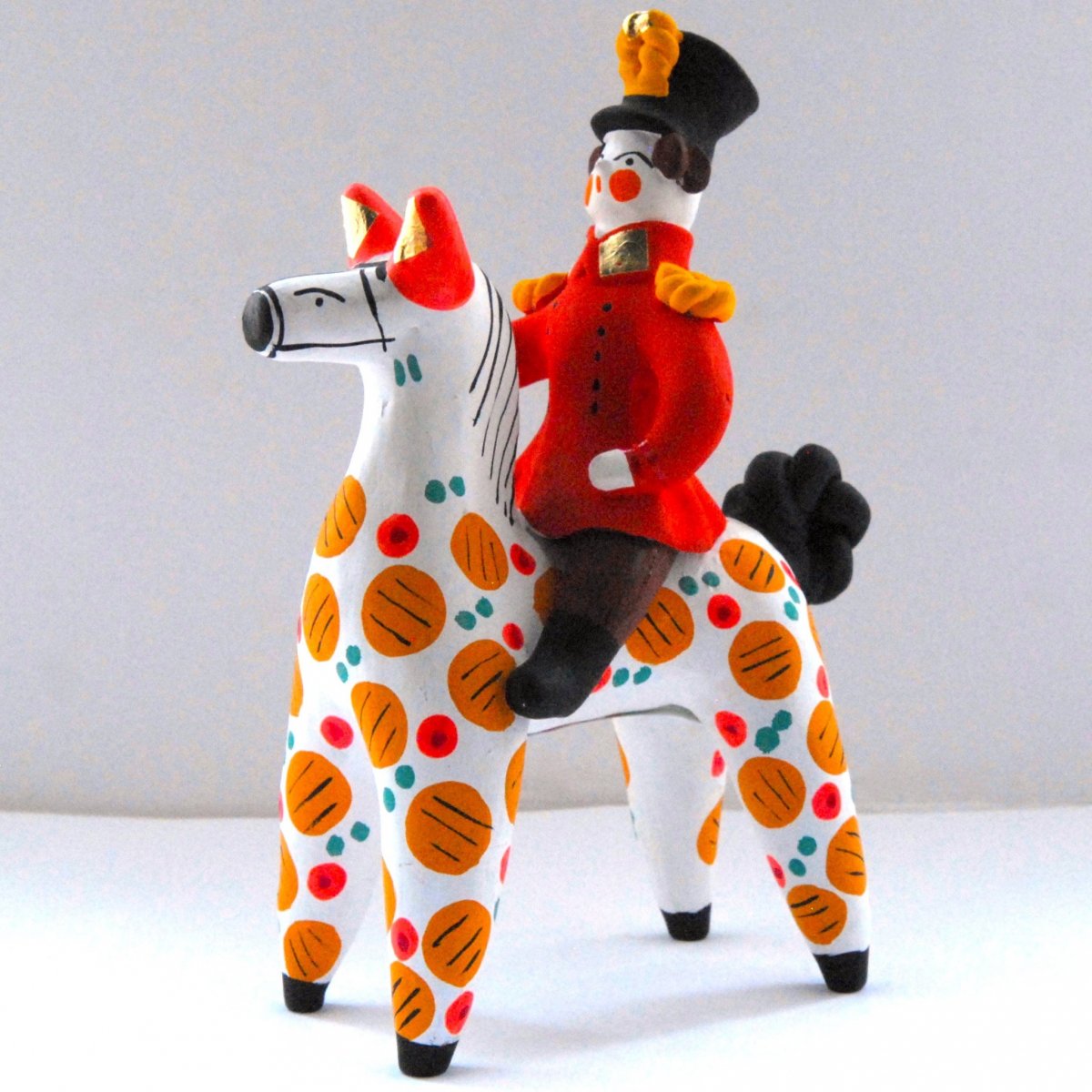 Дымковская роспись всадник