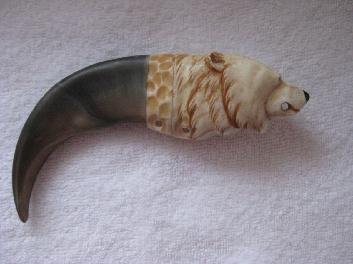 Медвежий коготь талисман