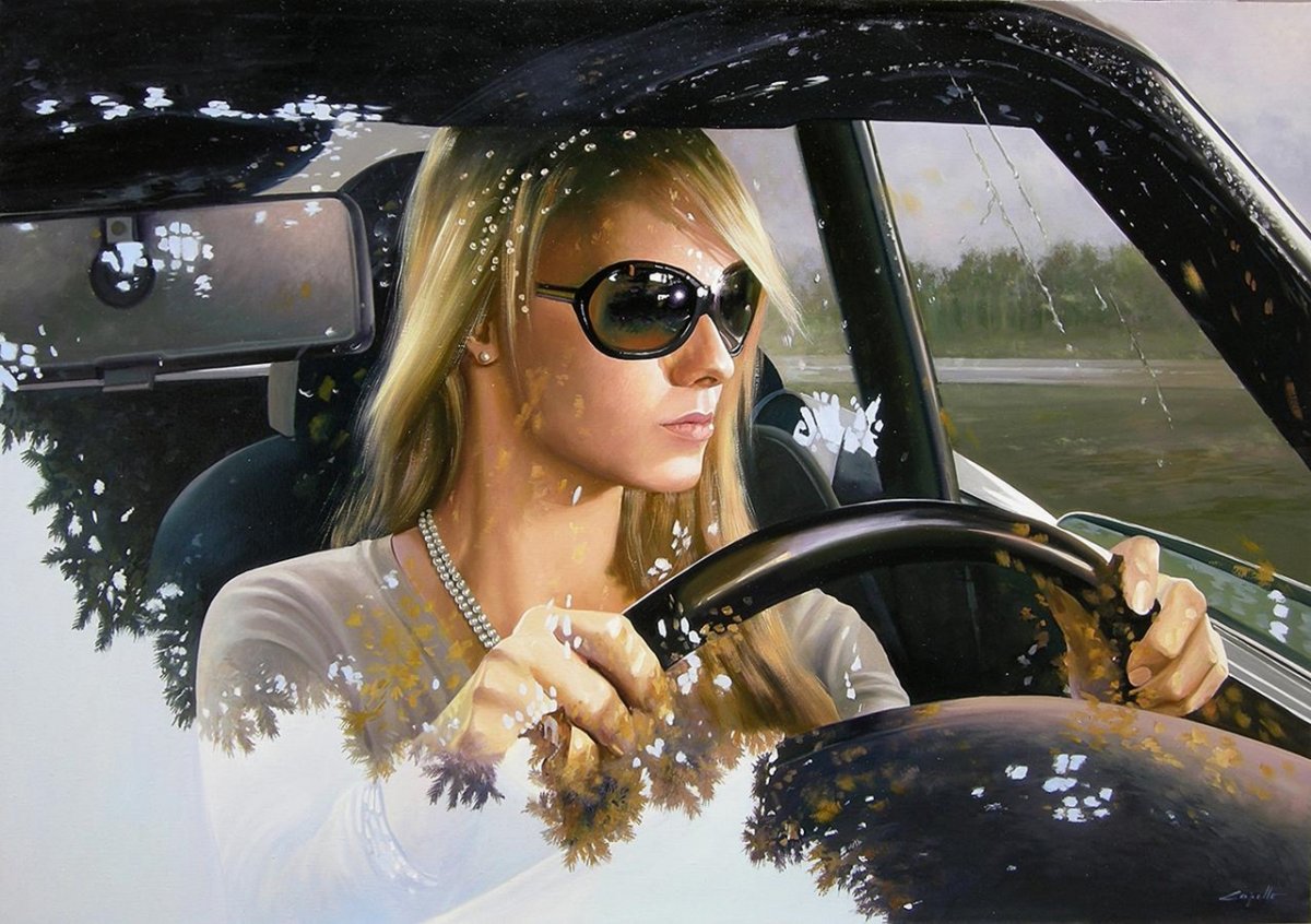 Девушка за рулем в дождь