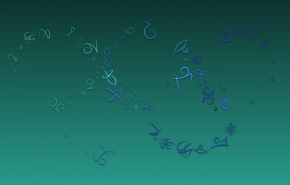 Знаки зодиака на зеленом фоне
