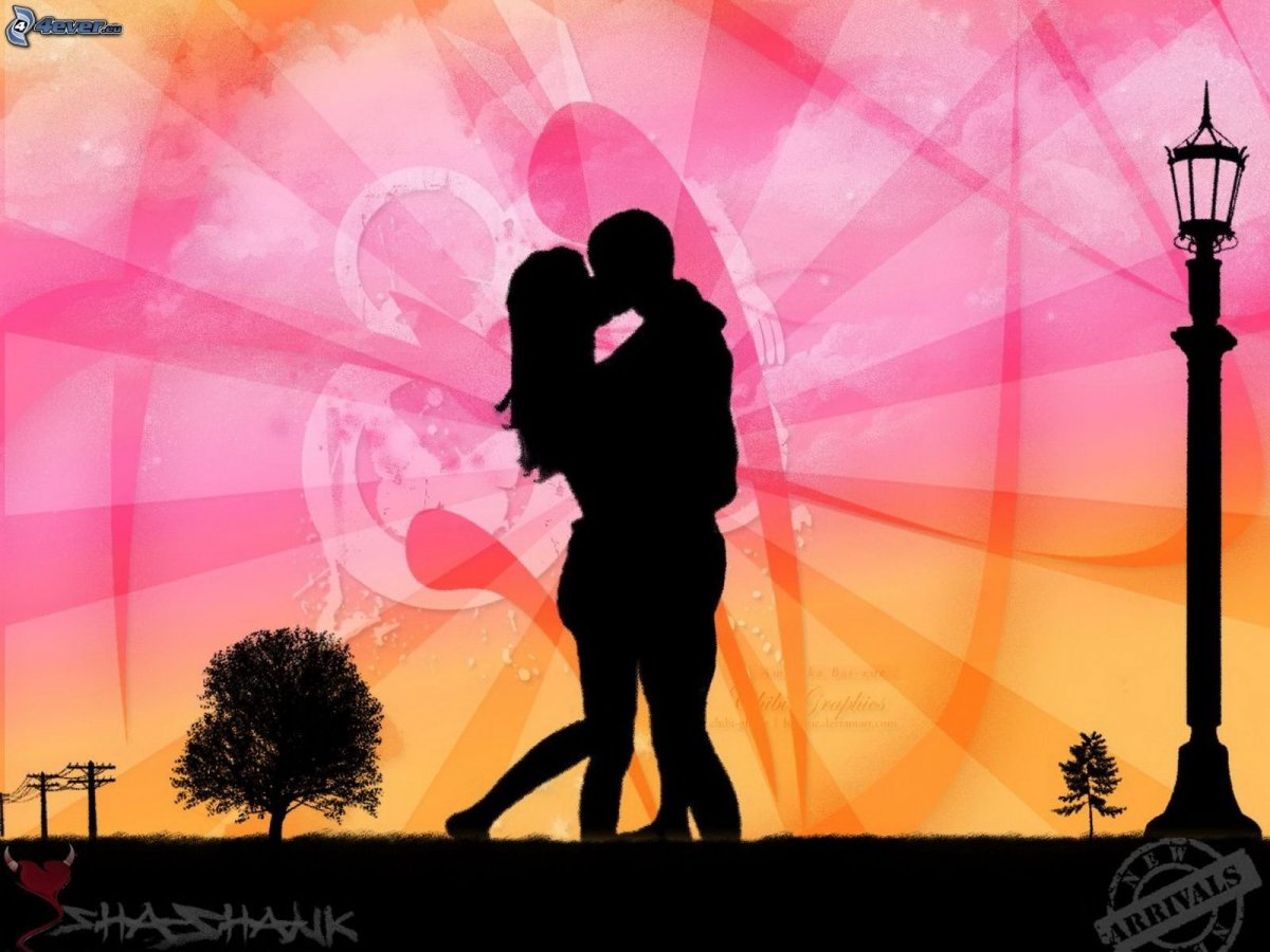 Силуэт влюбленной пары на фоне сердца