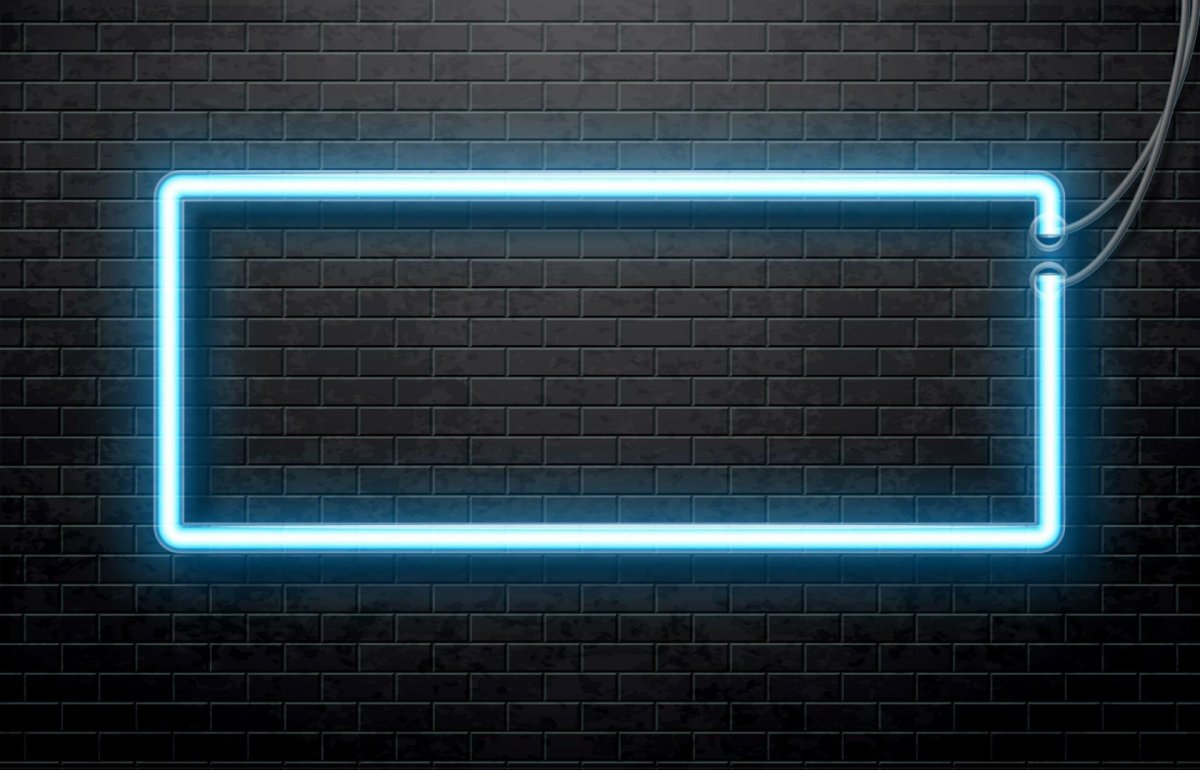 Неоновая рамка на кирпичной стене