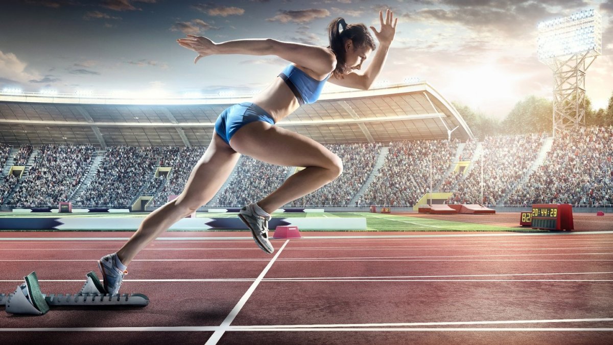 Девушка на старте бег