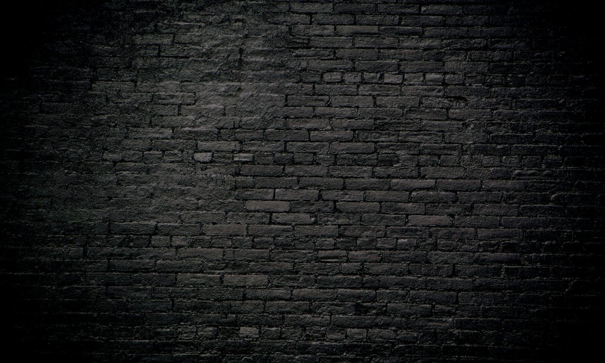 Черная кирпичная стена фон