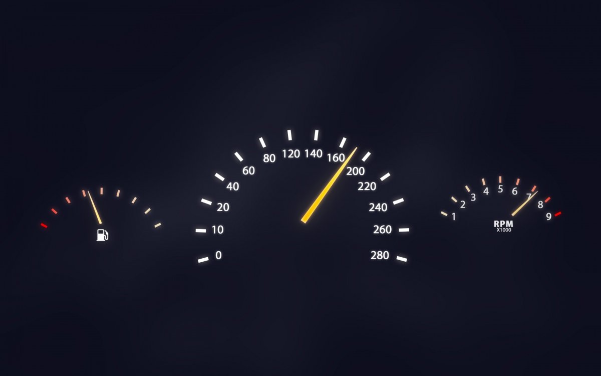 Спидометр на черном фоне