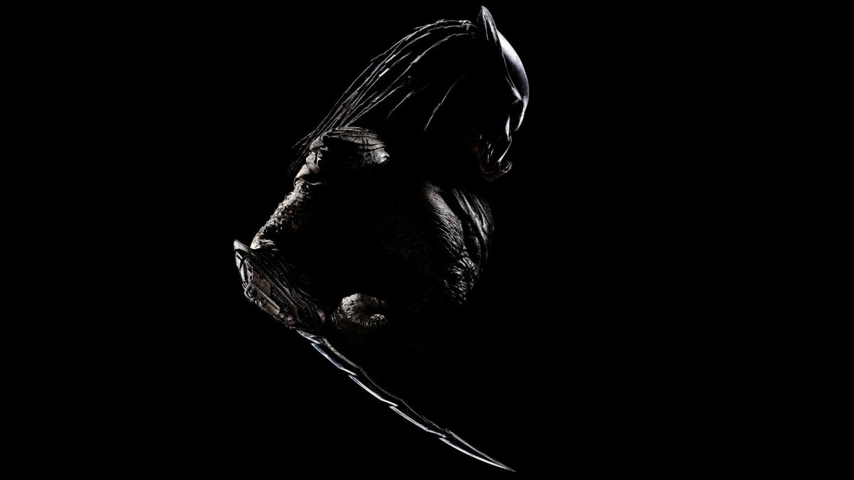 Хищник на черном фоне