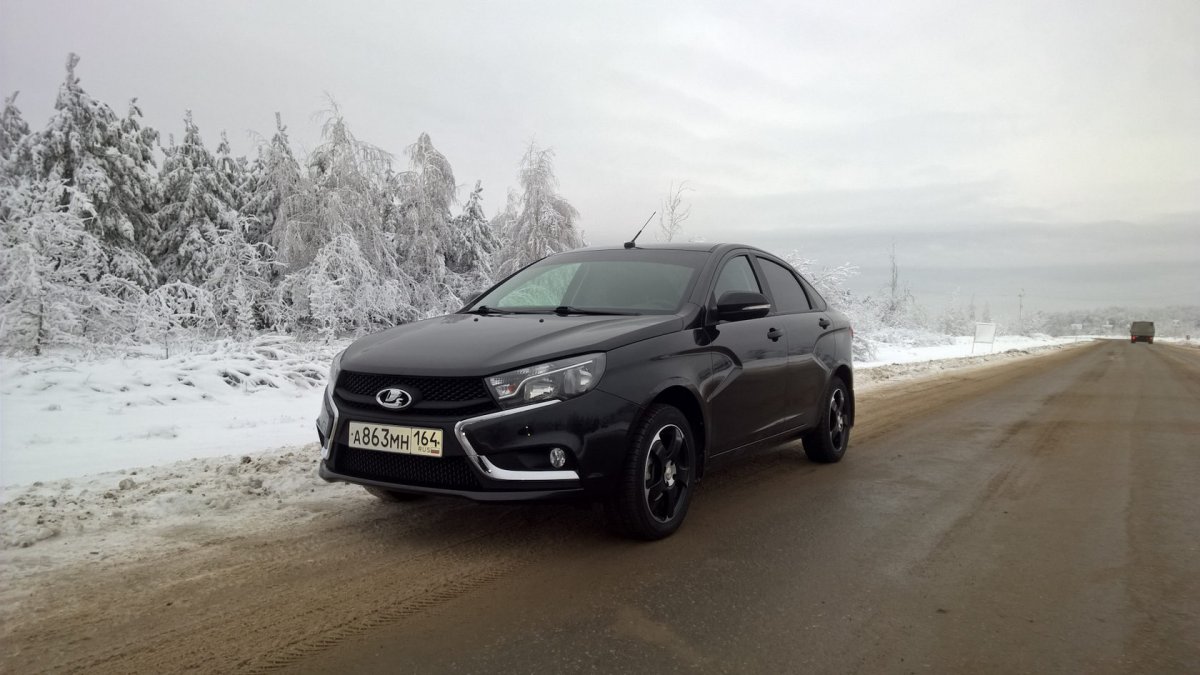 Лада Веста св черный зимой