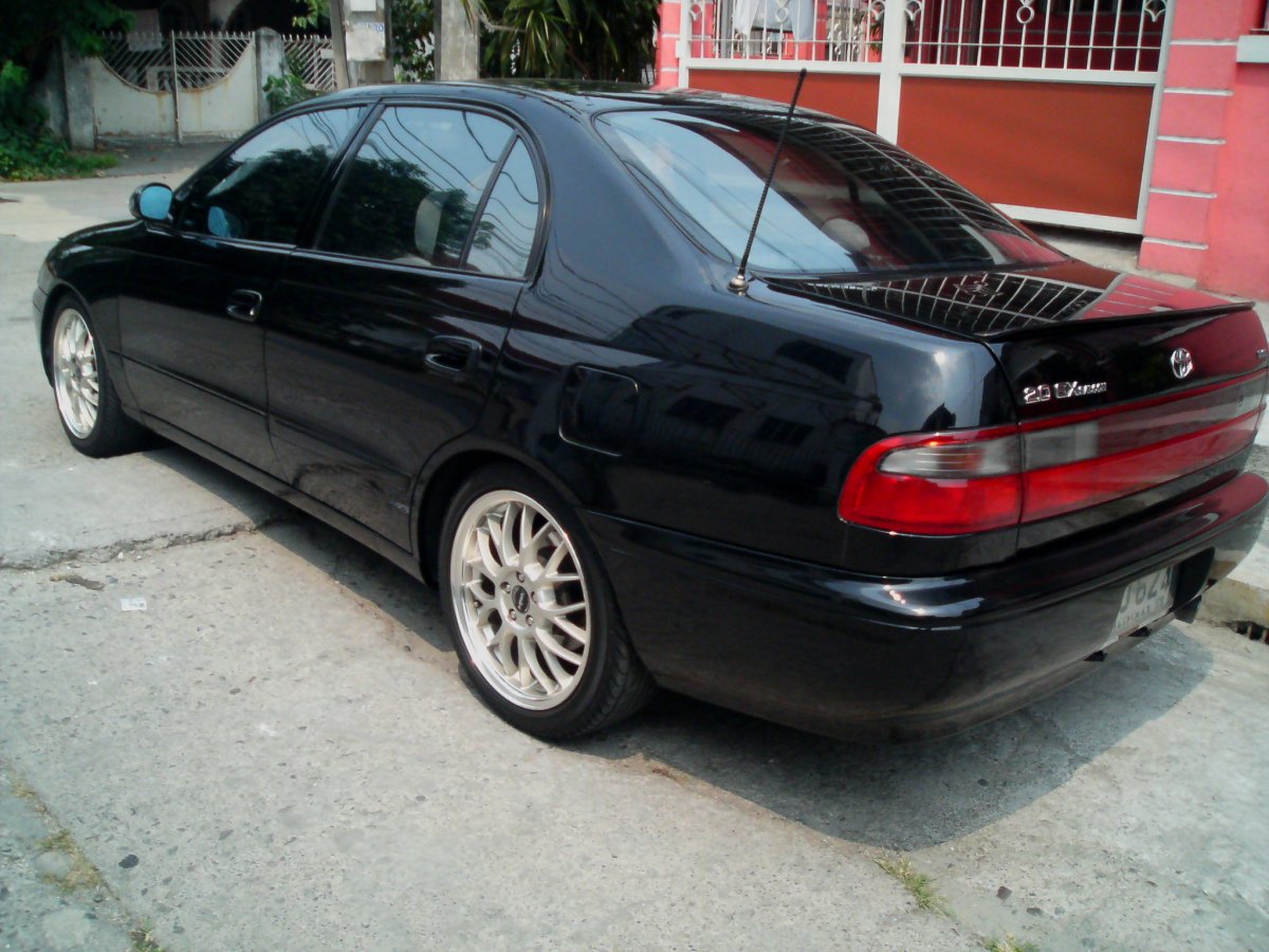 Тойота корона бочка чёрная в зимнем дрифте