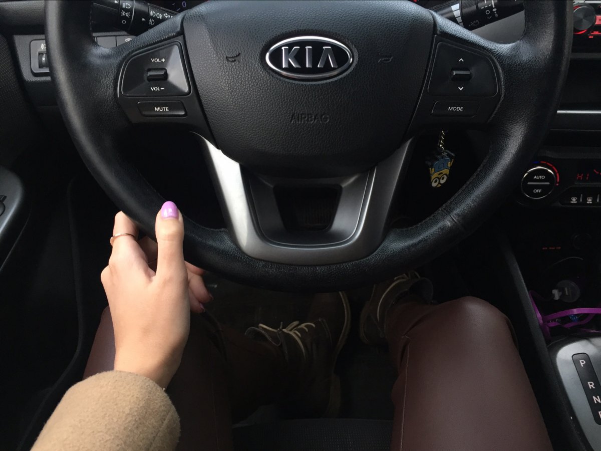 За рулем Киа Рио