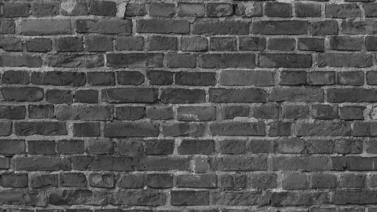 Серая кирпичная стена