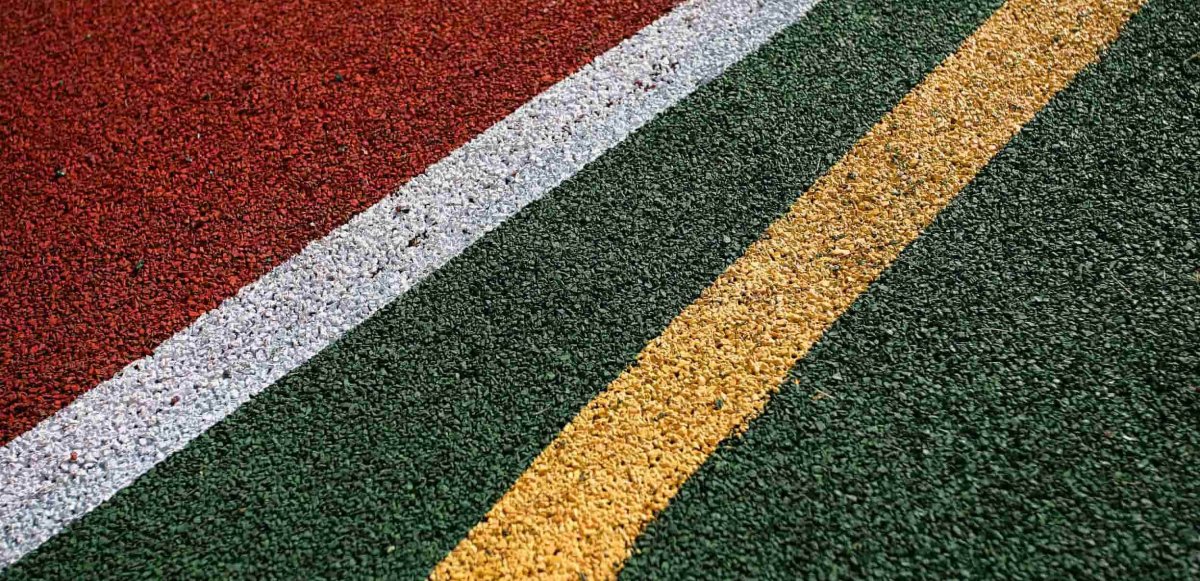 Тартановое покрытие для спортивных площадок