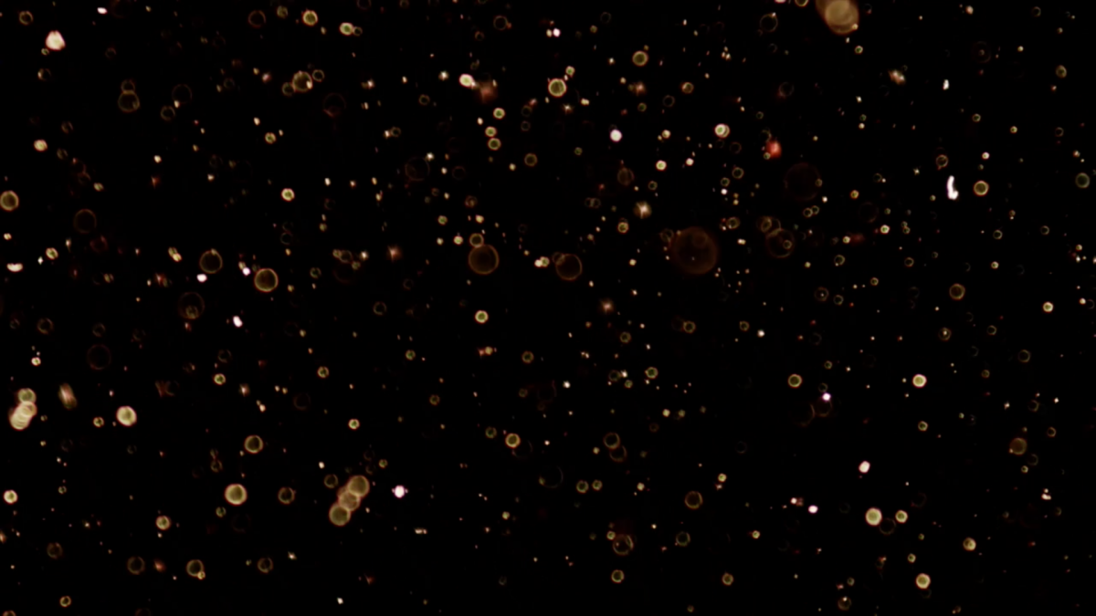 Частицы на черном фоне