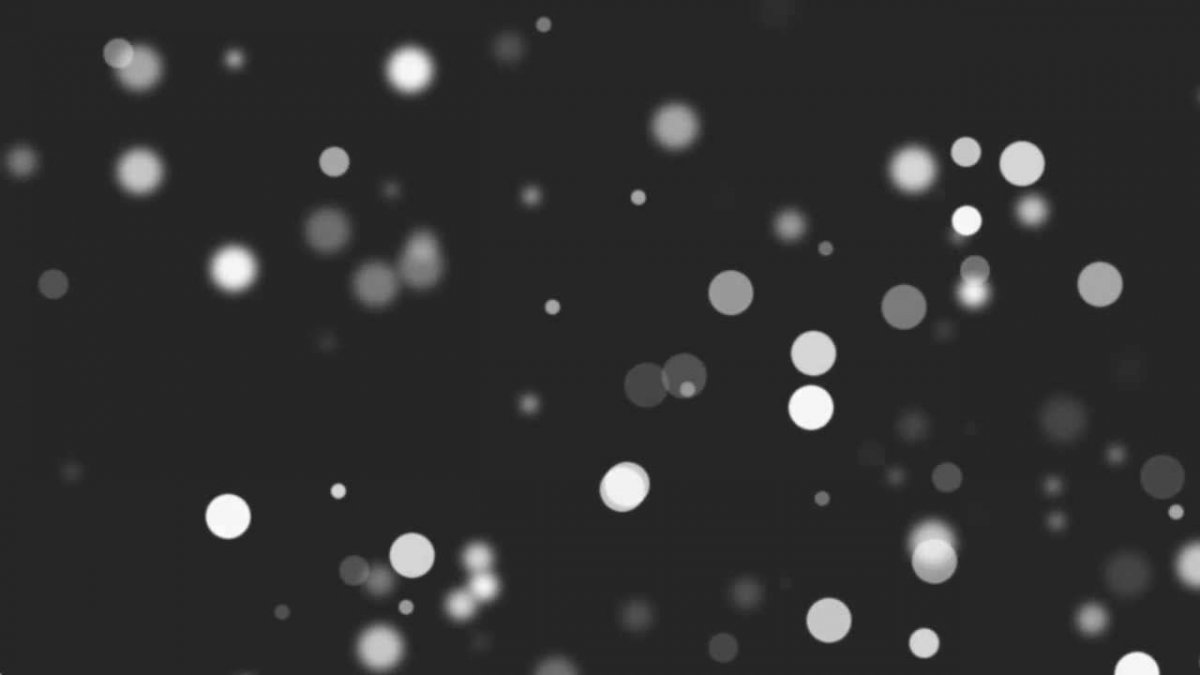 Белые частицы на черном фоне