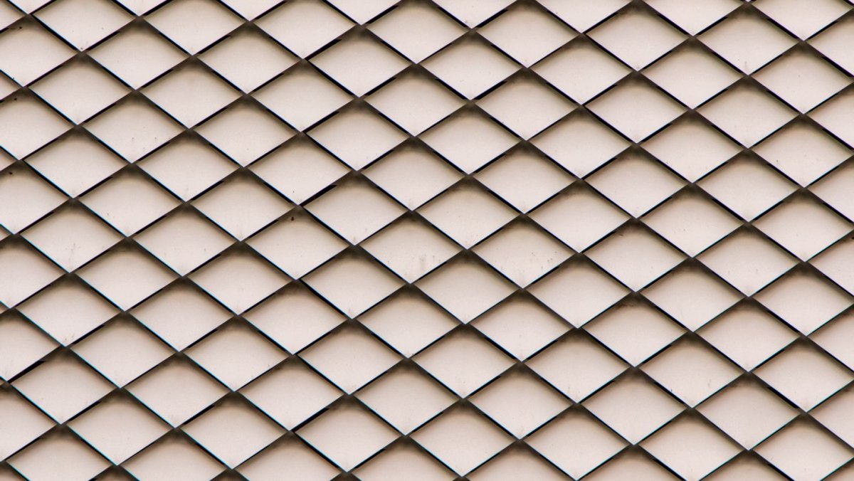 Кирпич в металлической сетке текстура