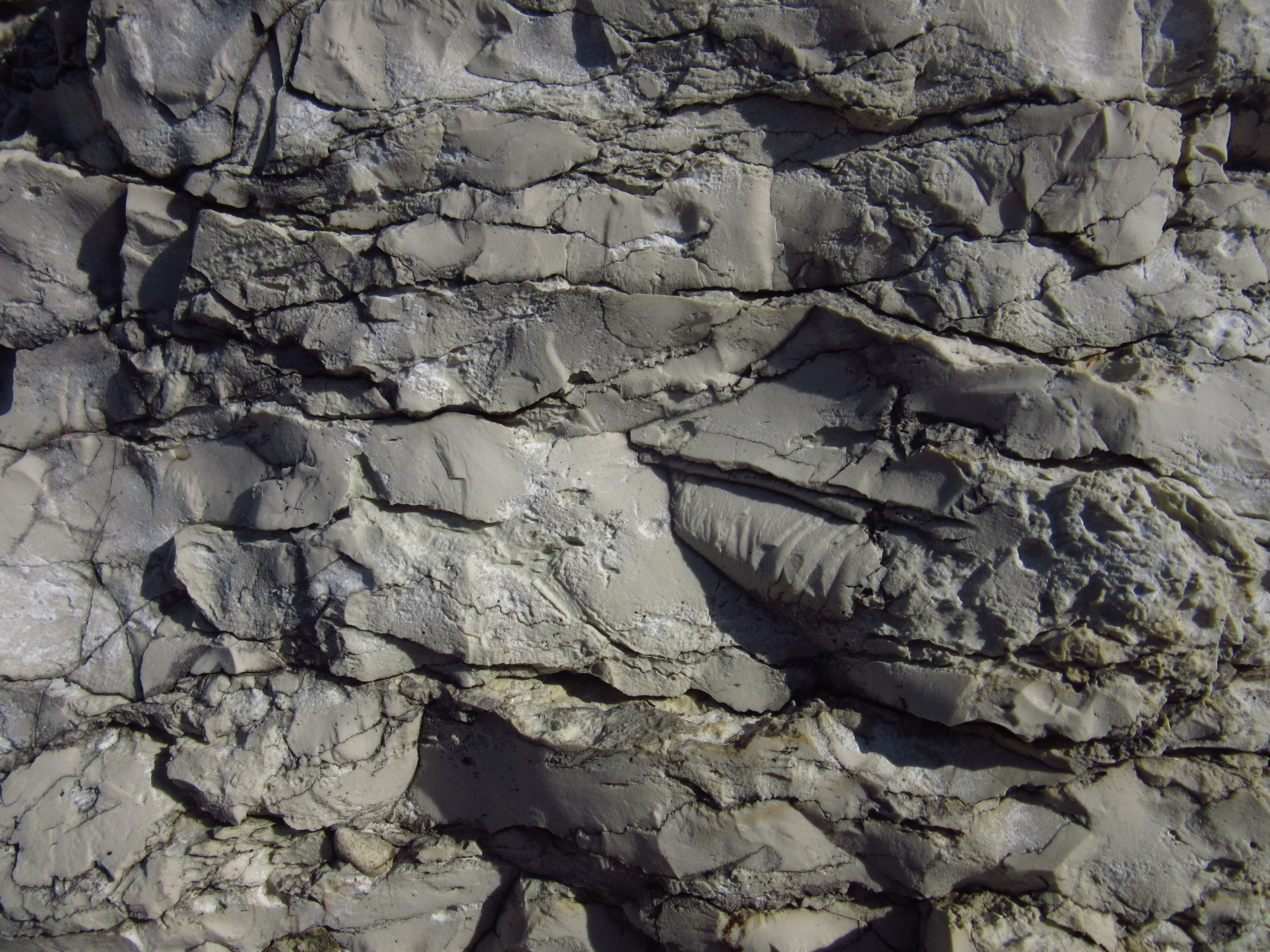 Рельеф скалы. Коренная порода Bedrock. Структура камня скалы. Каменная поверхность.