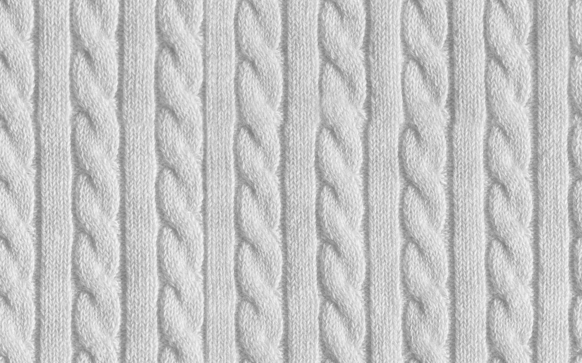Белая вязаная ткань