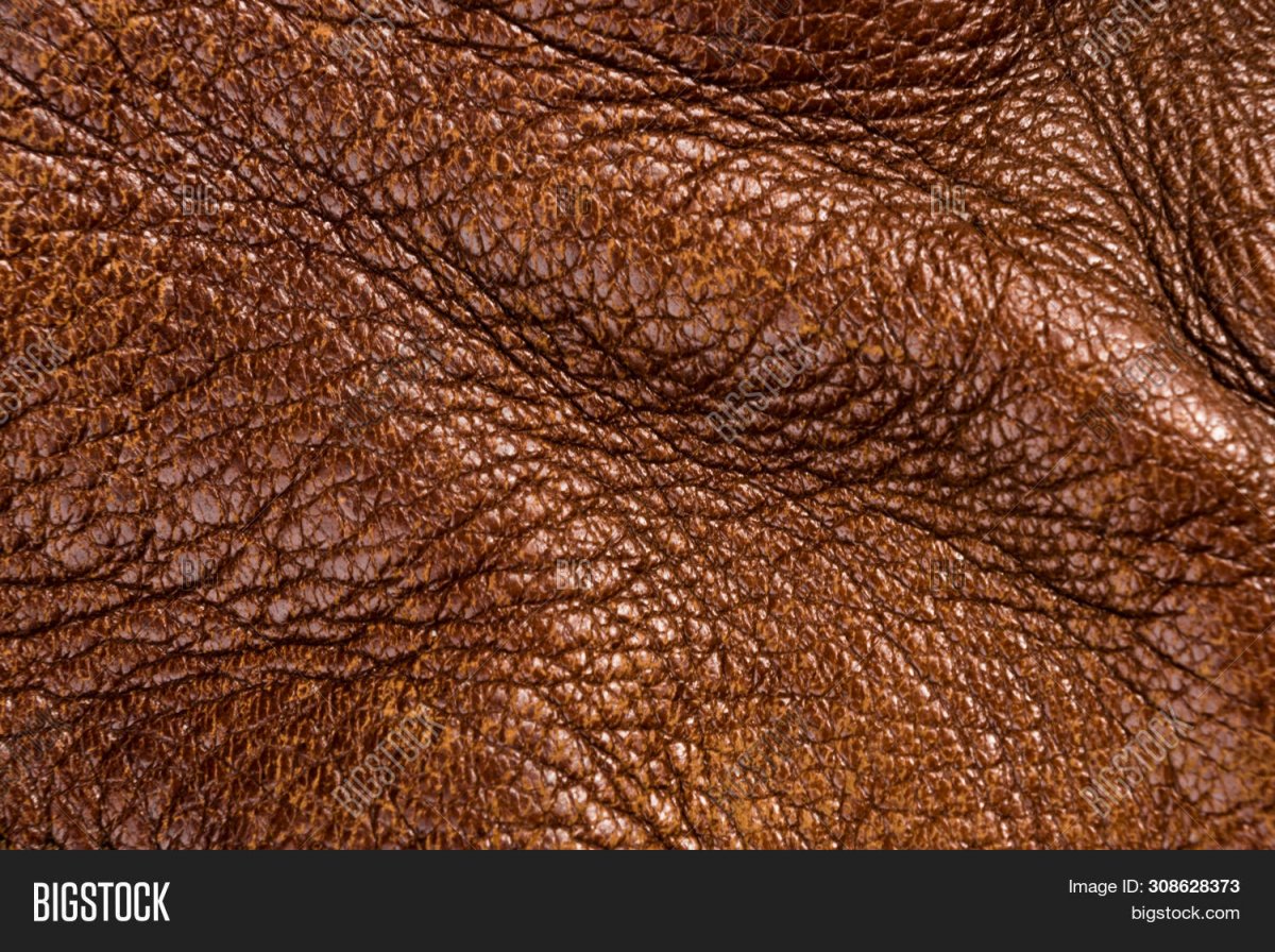 Потертая коричневая кожа