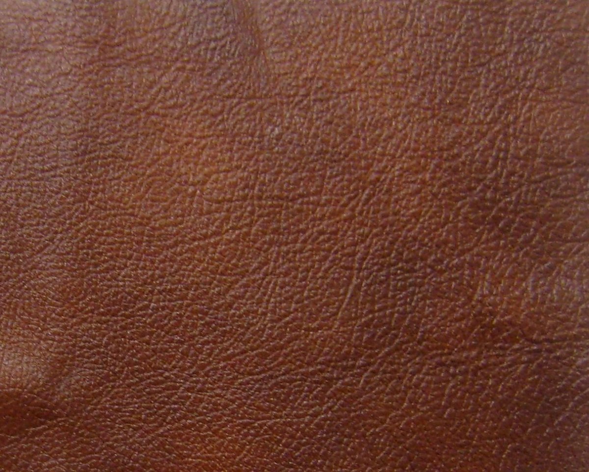 Темно коричневая кожа