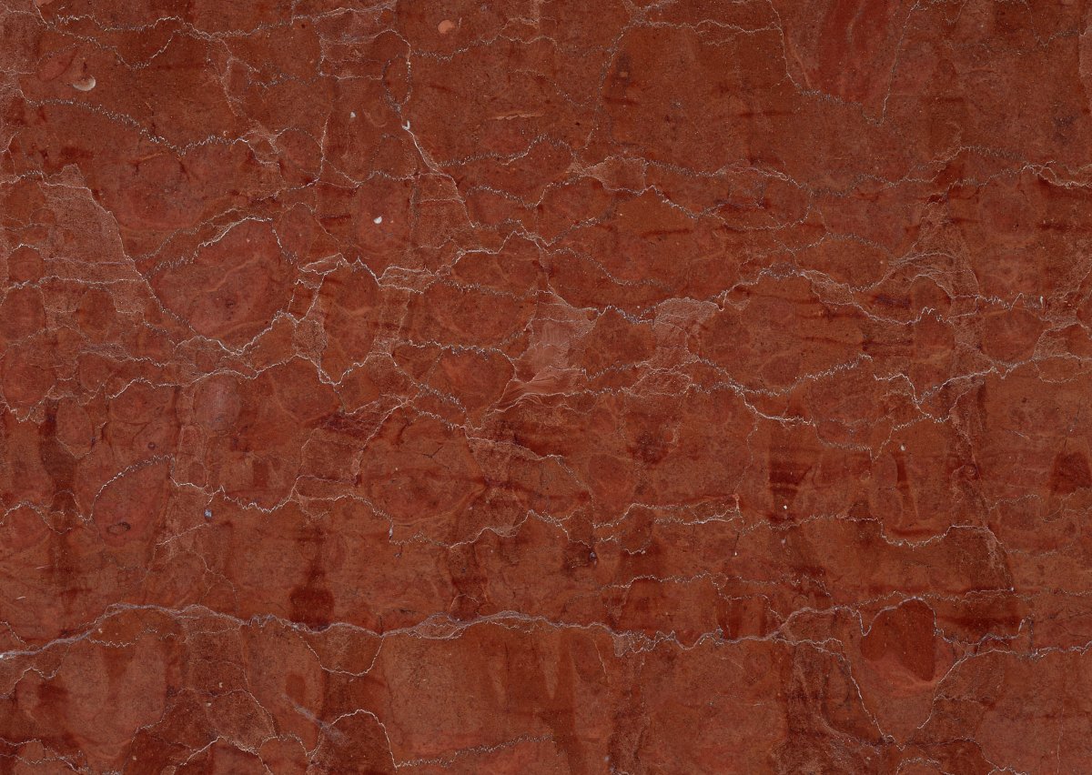 Темно красный мрамор