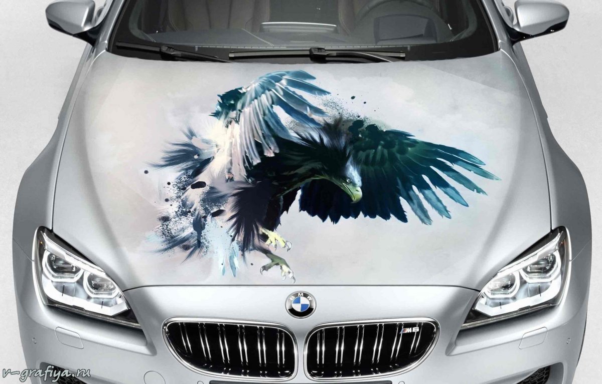 Машина с ягуаром на капоте