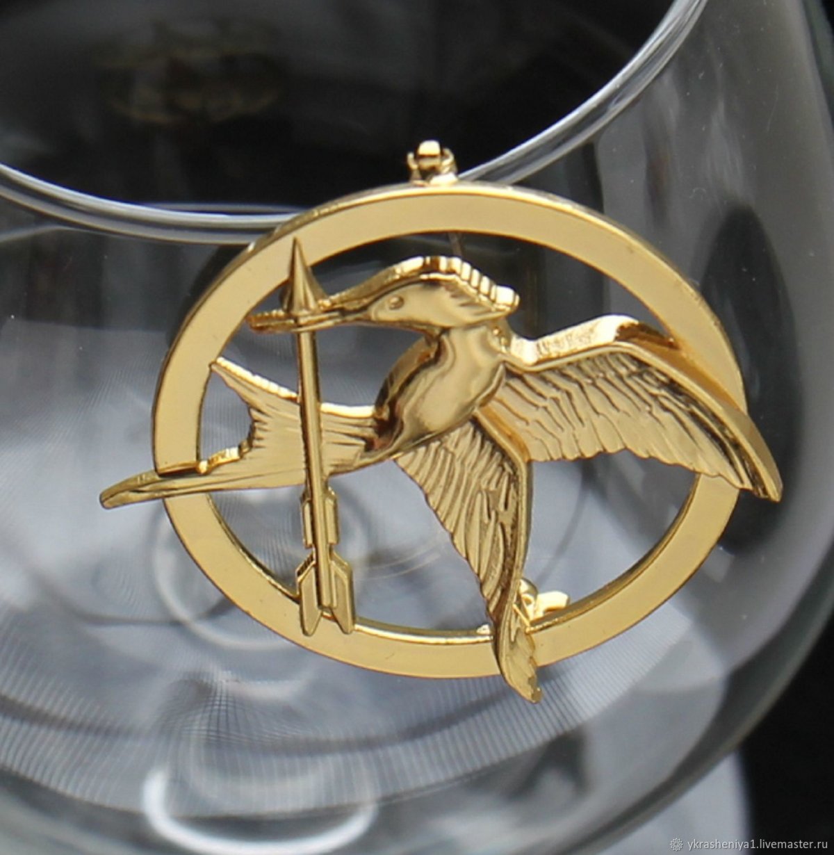 Сойка пересмешница символ