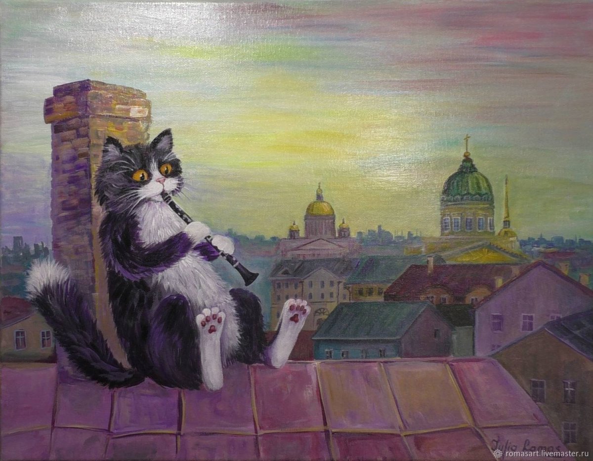 Кот сидит на крыше