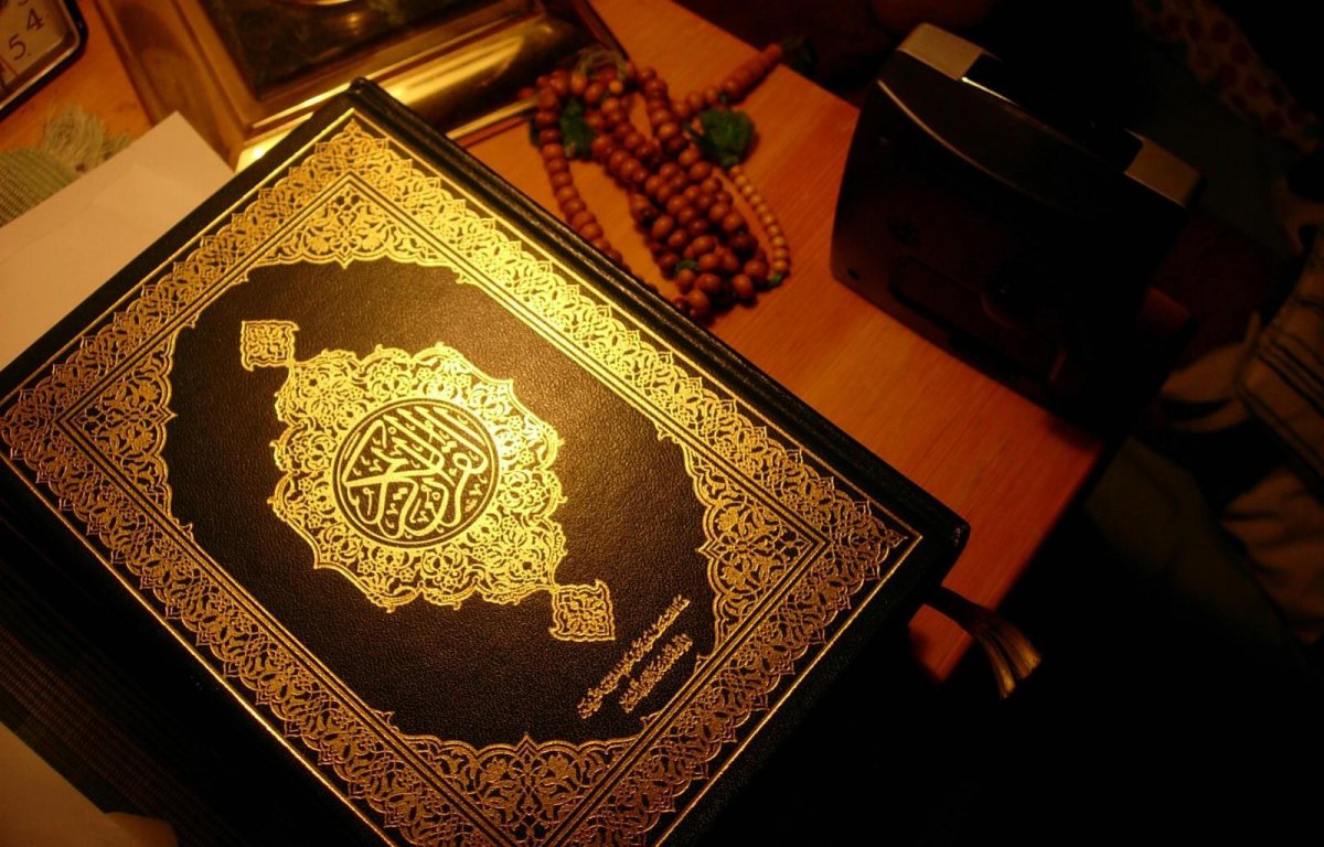 Монета запрет Корана