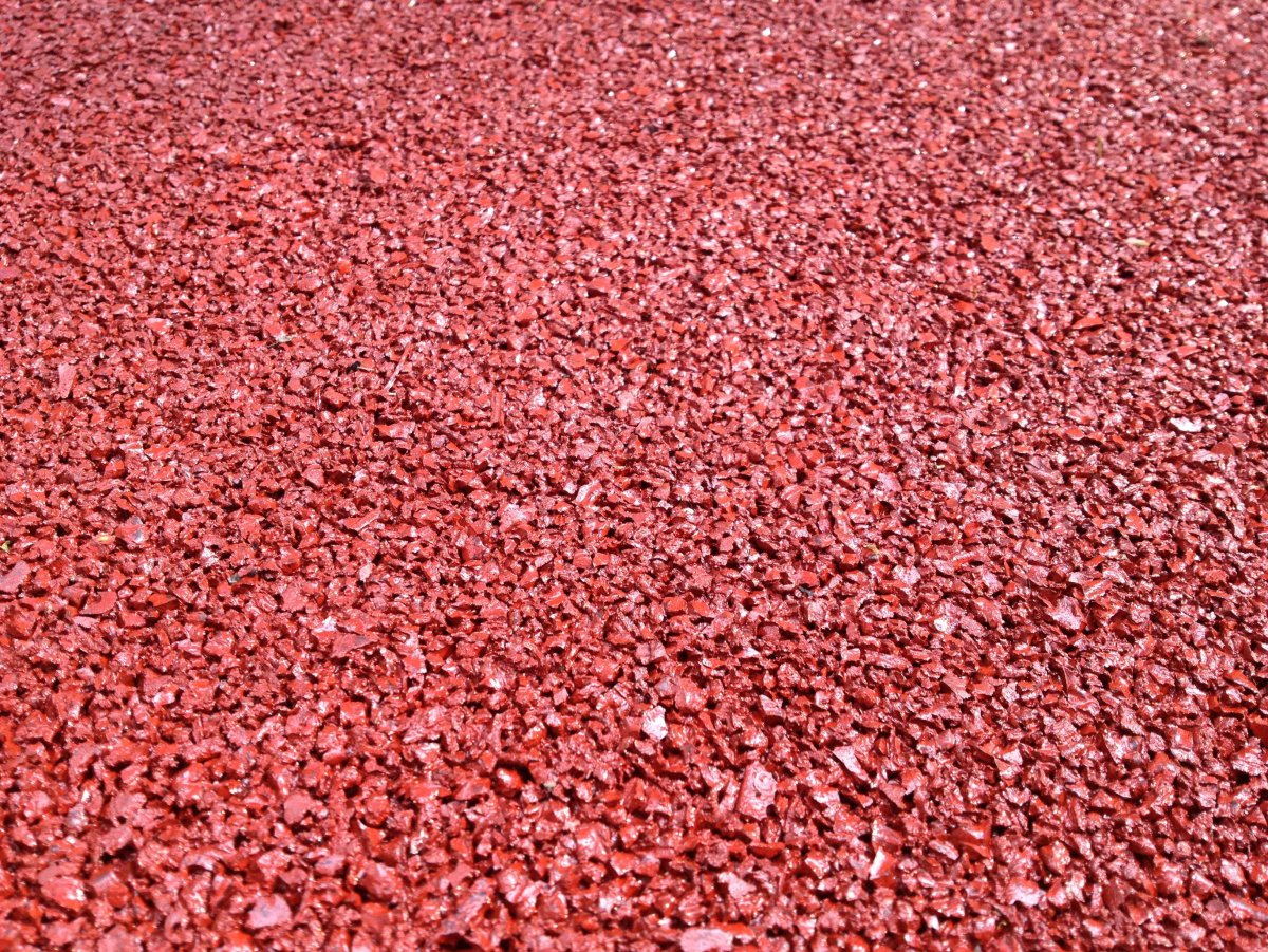 Тартановое покрытие для спортивных площадок