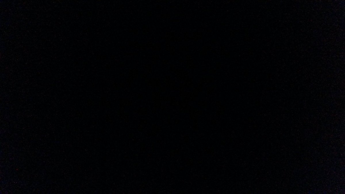 Белый круг на черном фоне