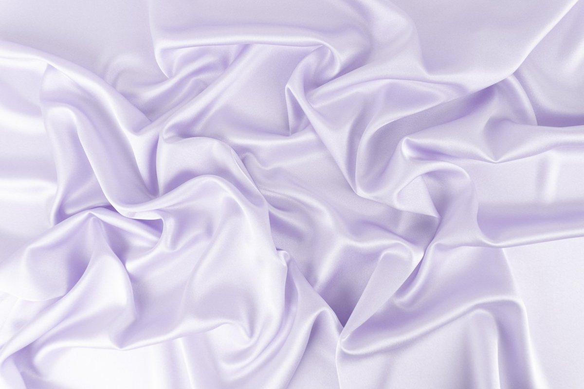 Белая ткань складки