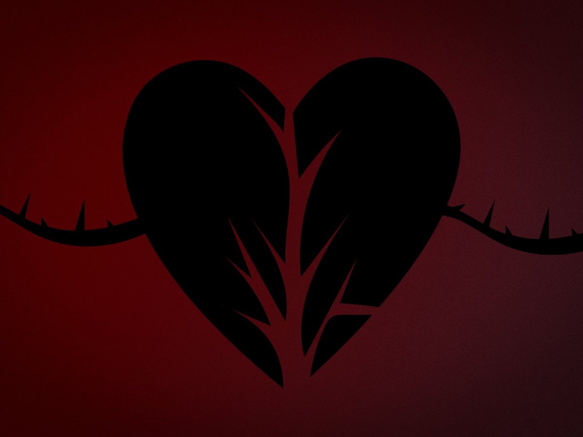 Разбитое сердце на черном фоне