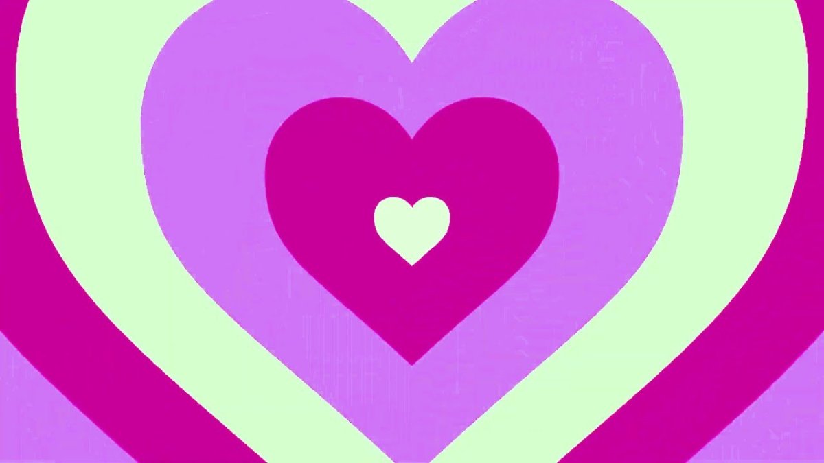 Разноцветные сердечки на розовом фоне