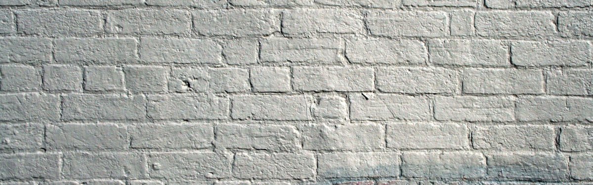 Серая кирпичная стена