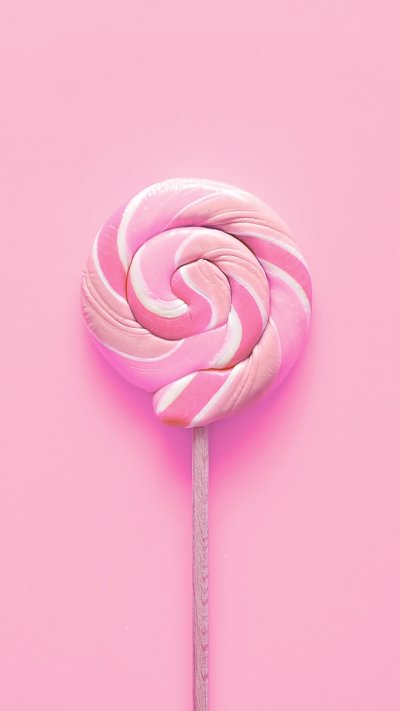 Розовый фон с леденцами